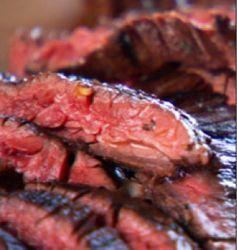 Grilled Latin Styled Skirt Steak with grilled onions and peppers