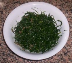 Agretti with capers and anchovies